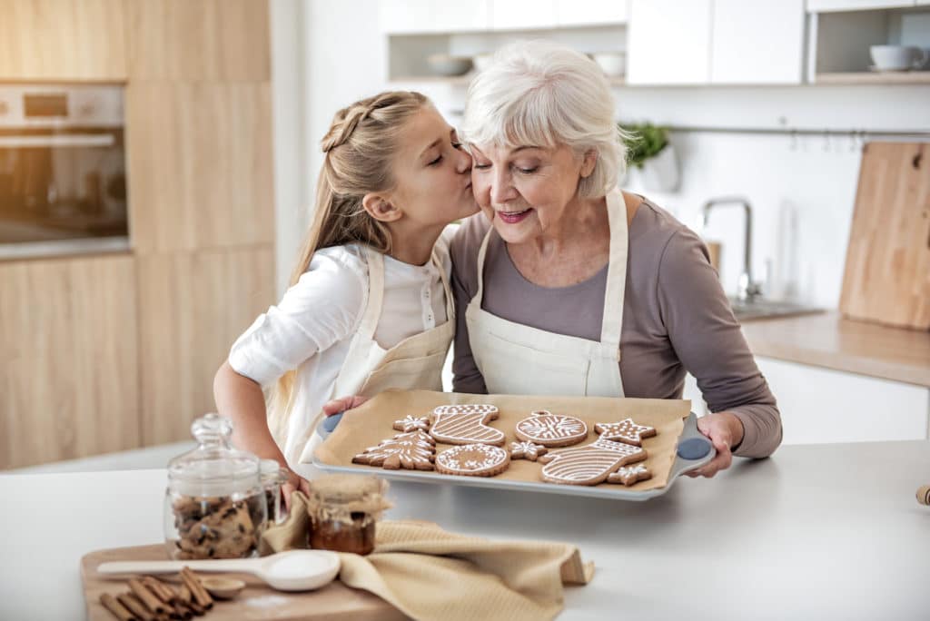 Grandma baking with grandchild