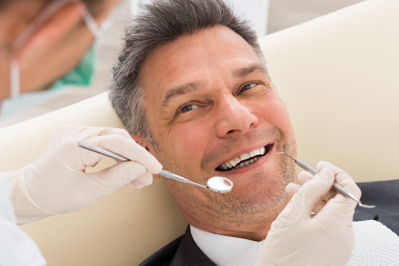 Over 50 male getting dental check-up